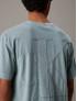 CALVIN KLEIN T-SHIRT CON LGO SUL RETRO APPLICATO