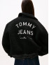 TOMMY JEANS BOMBER COLLEGE IN SHERPA CON LOGO